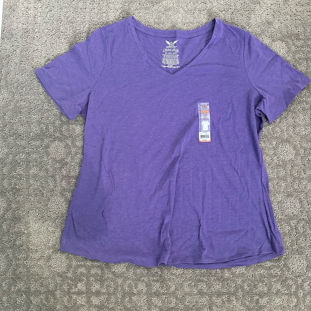Nwt 5 shirts 3 with tags on them, 1 without and one shirt has been worn 2X